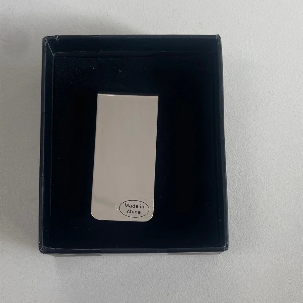 Saks Fifth Avenue Silver Phone Clip